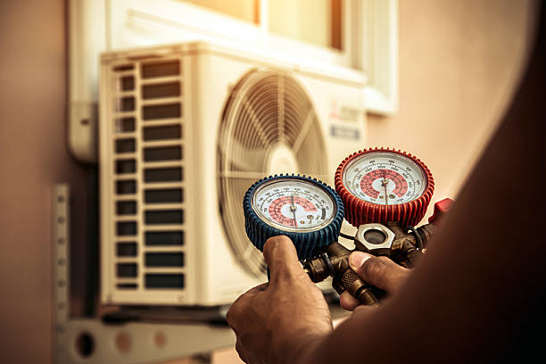 Professional Heat Pump Repair technician working in Rion, SC